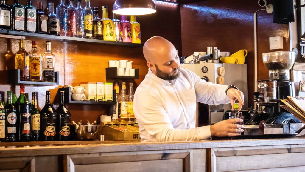 Owner Jamie Milligan serving drinks at the Steamboat Inn Carsethorn Bar